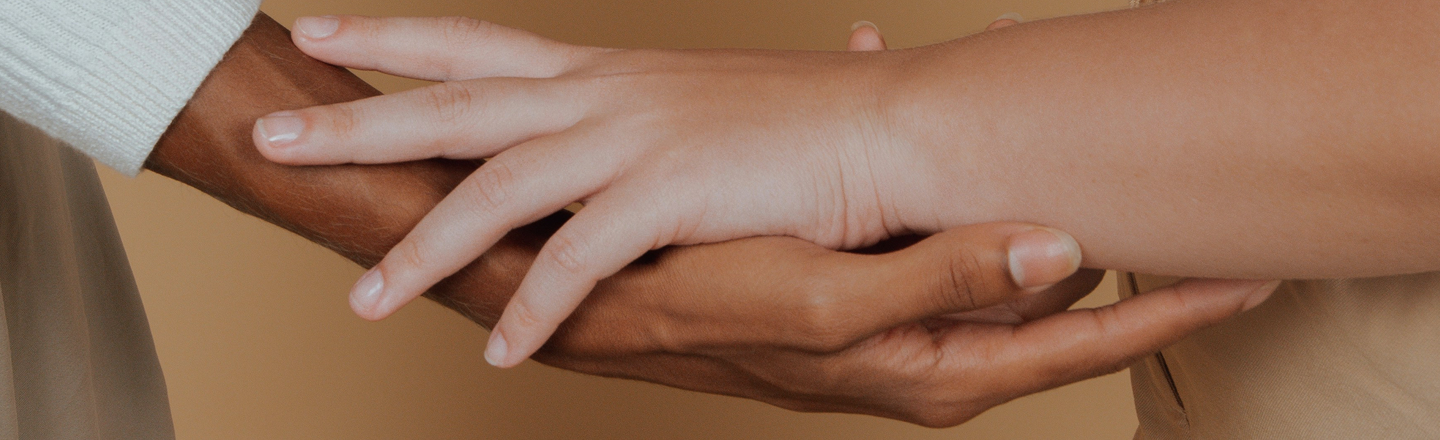 Hands holding each other